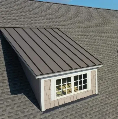 two chimneys on the roof of a house