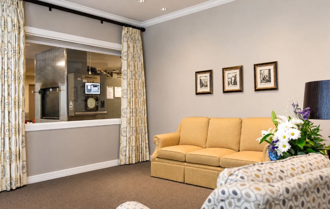 Quiet family sitting area connected to an on-site crematory in Grand Prairie, TX.