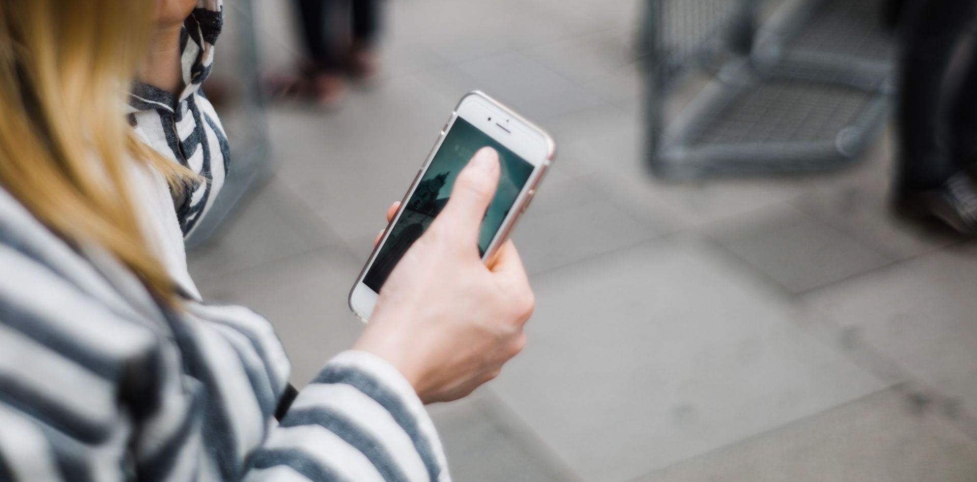 woman holding phone
