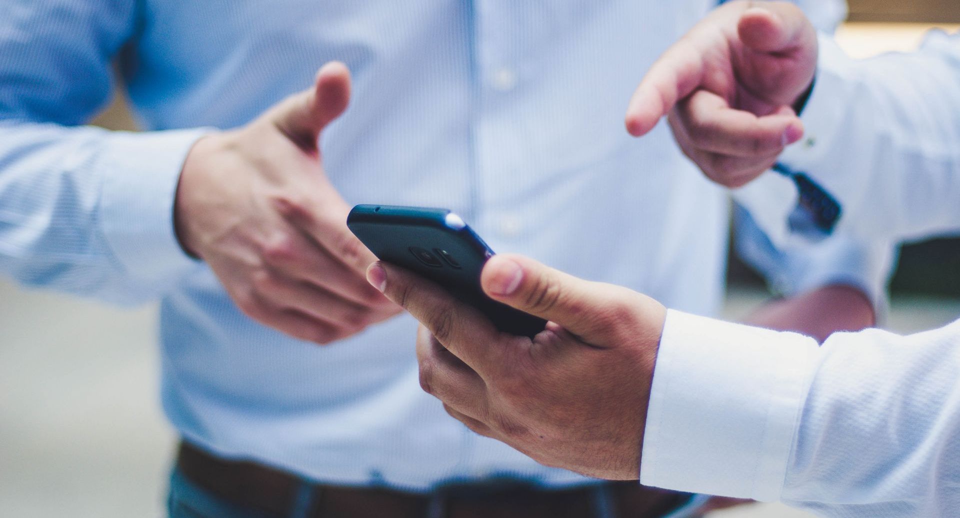 businessmen using cell phone