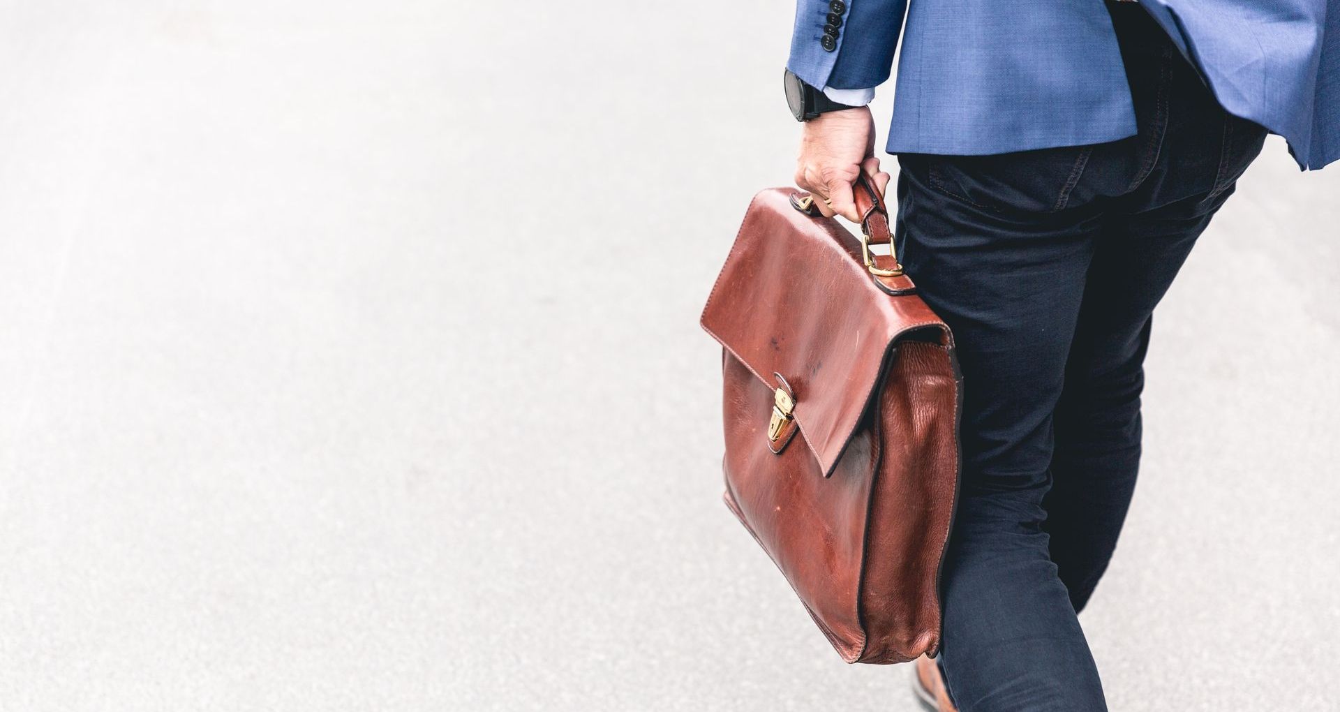 man walking with briefcase