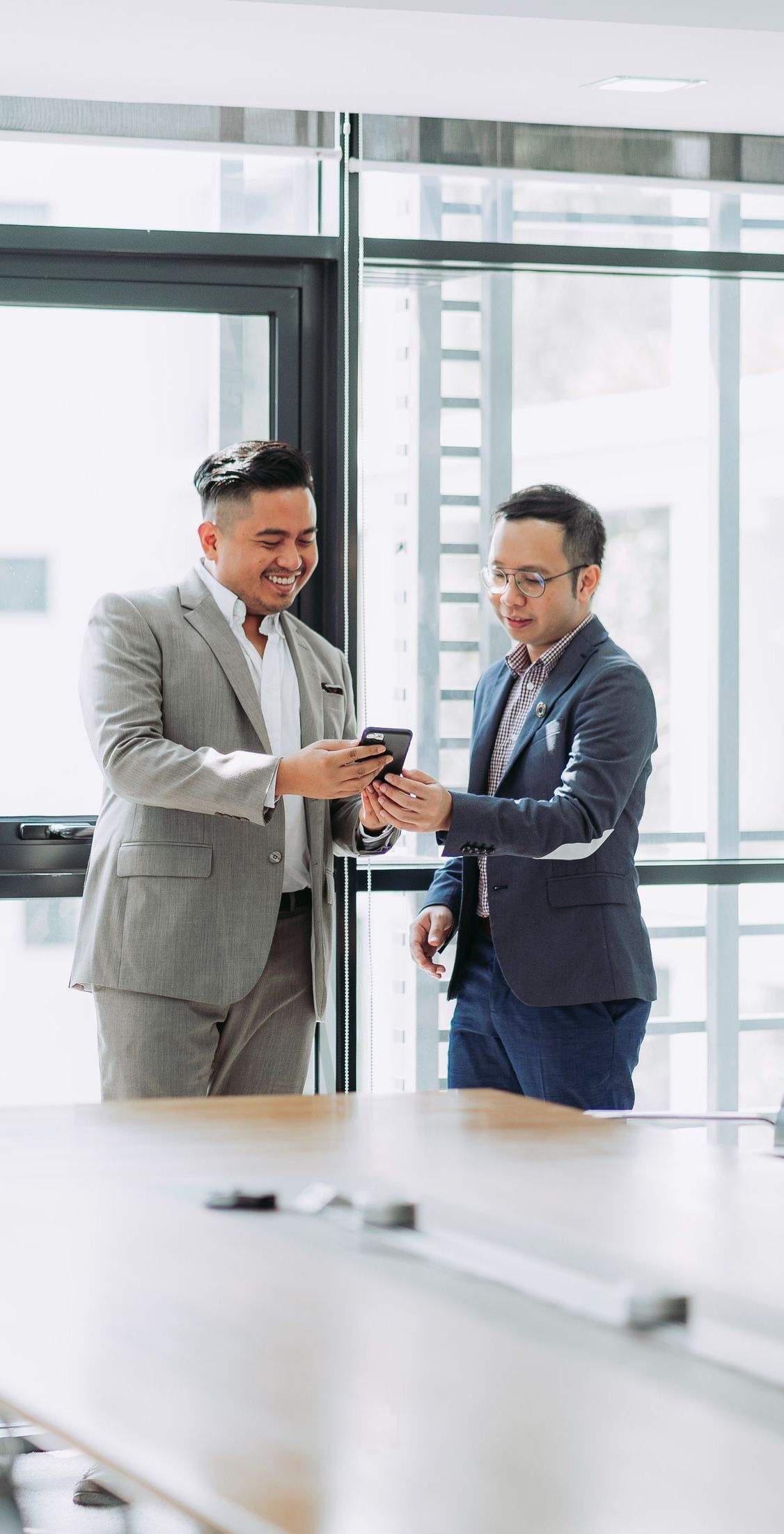 businessmen on a phone