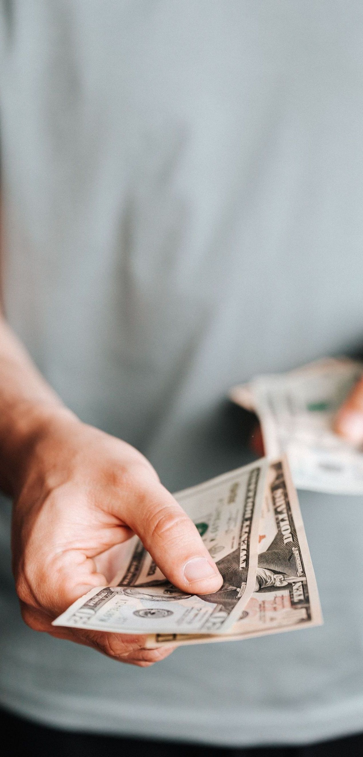 man holding money