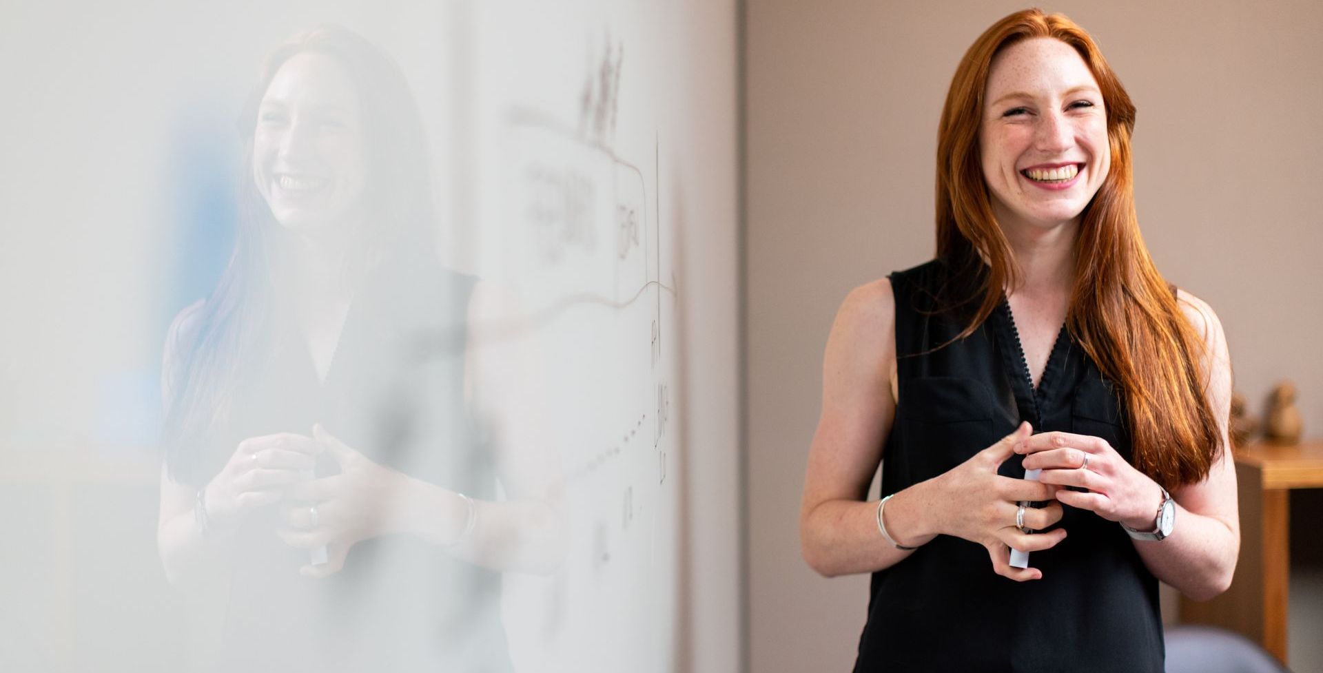 woman at whiteboard