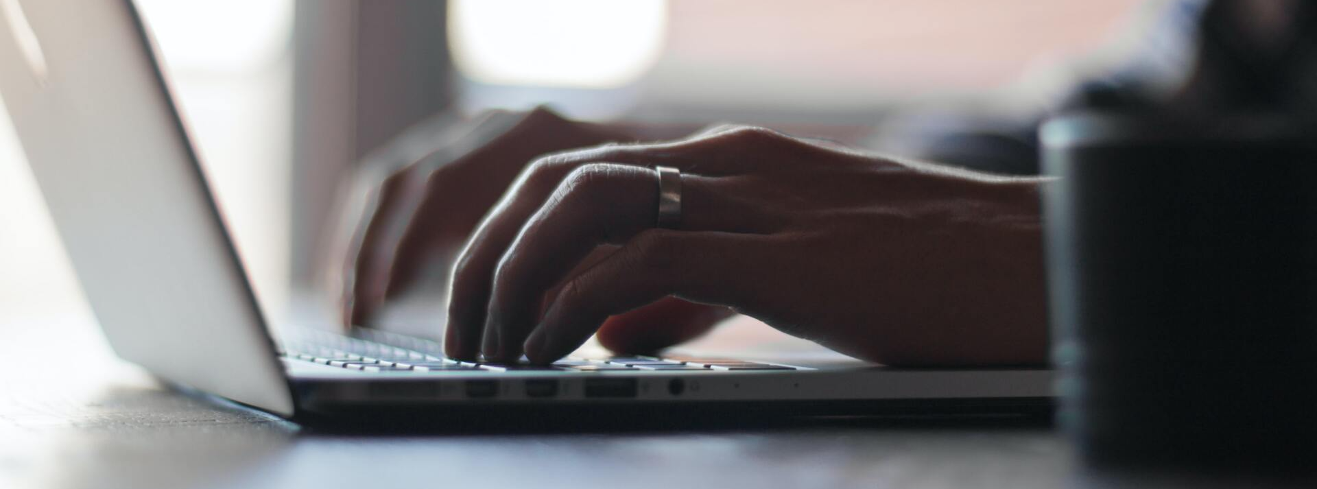 typing on a laptop