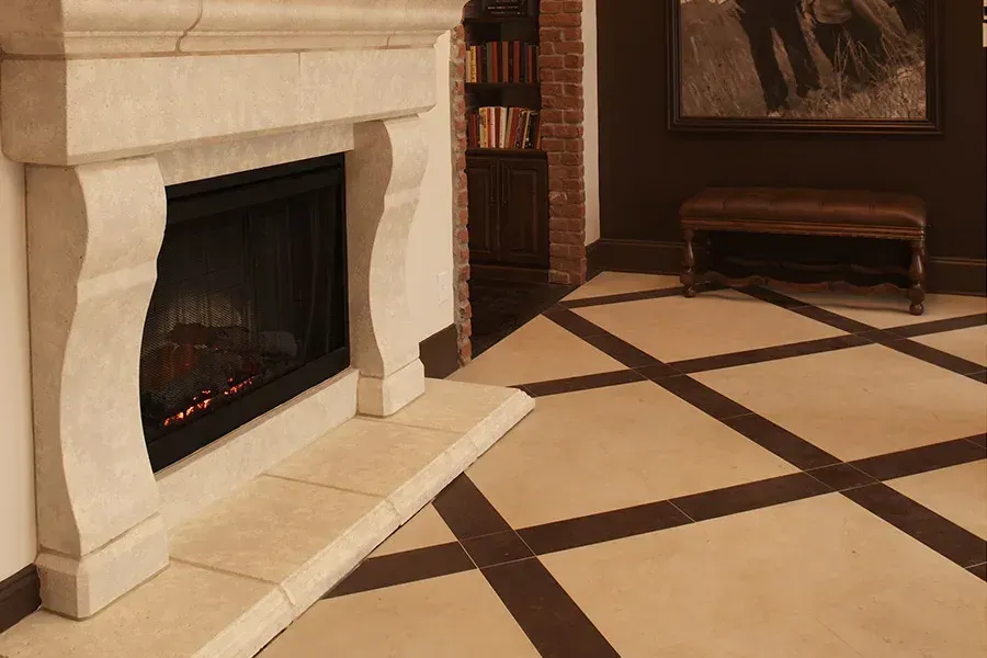A living room with a fireplace and a bench