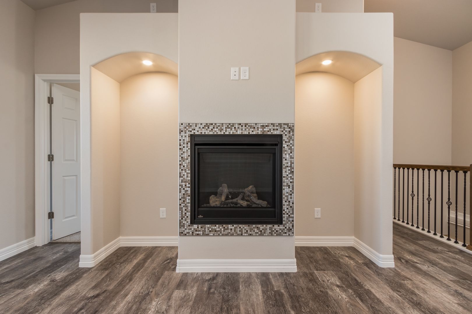 There is a fireplace in the middle of the room.