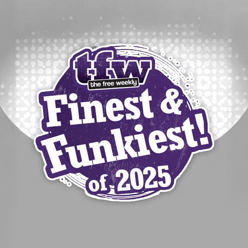 A purple circular badge with white text that reads 