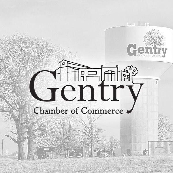 The Gentry Chamber of Commerce logo featuring a building line drawing over a faint image of the Gentry water tower.
