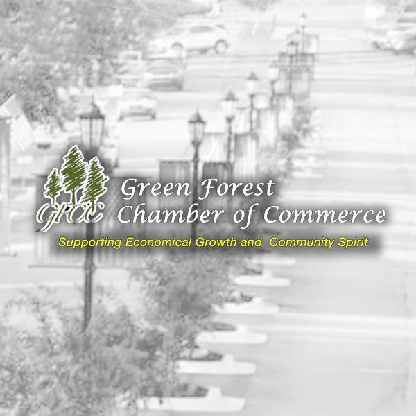 Green Forest Chamber of Commerce logo featuring three green pine trees over a faded street scene.