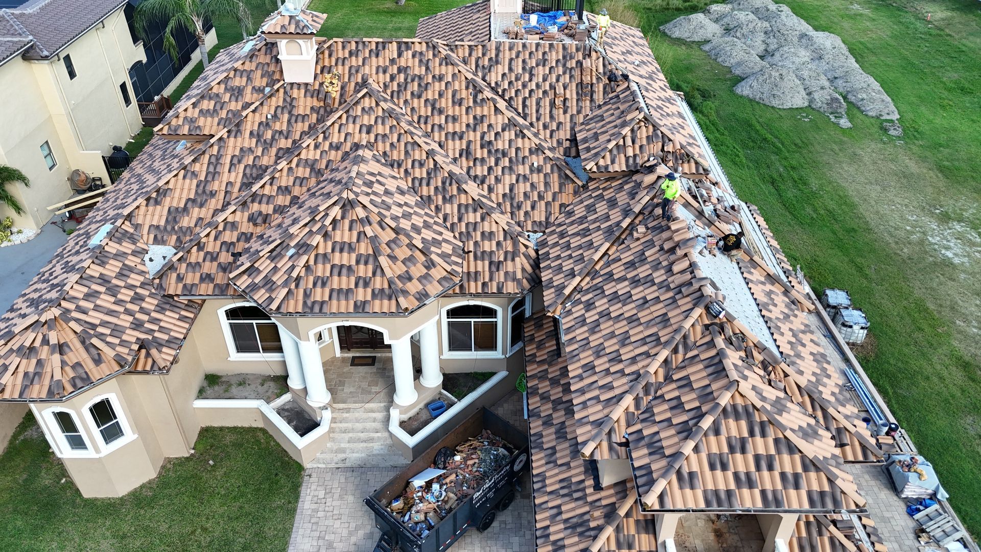 Roofer in Apollo Beach FL: aerial view of a new roof installed by Red Truck Roofing