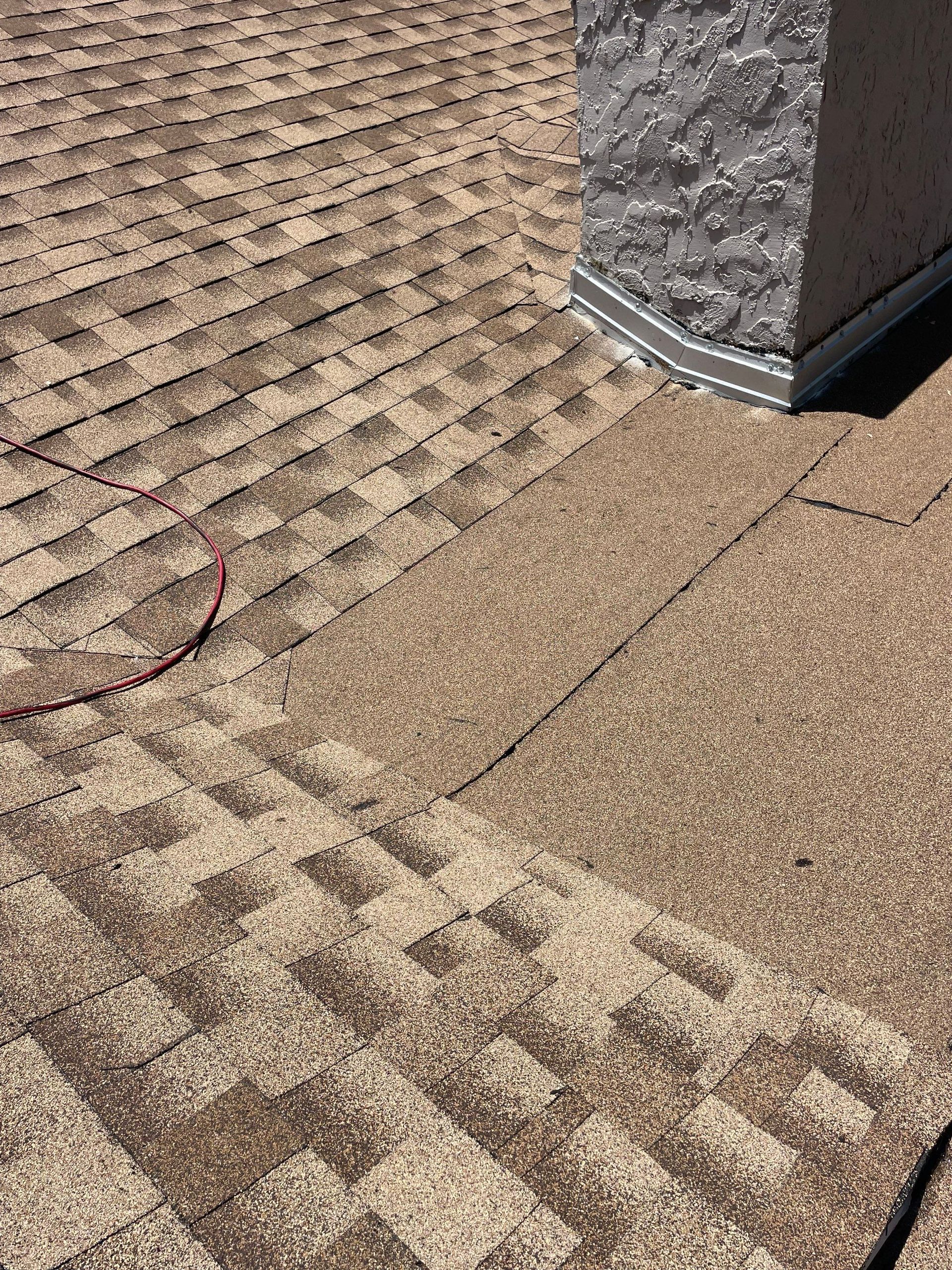 Roof repair Seminole FL: Red Truck Roofing technician inspecting and repairing a roof slope under SB 4-D rules