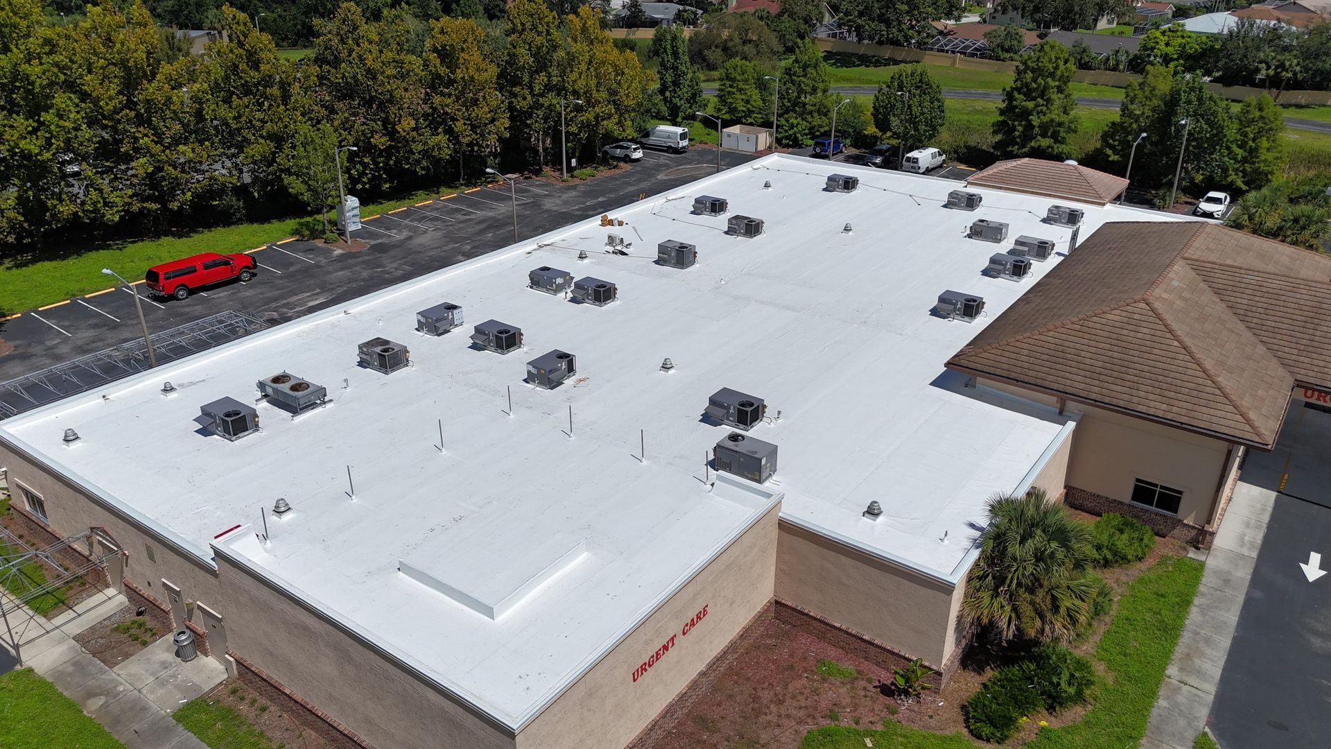 Multi family roofing contractor Seminole FL: Red Truck Roofing reroofing Bardmoor and Tamarac by the Gulf condo and villa buildings