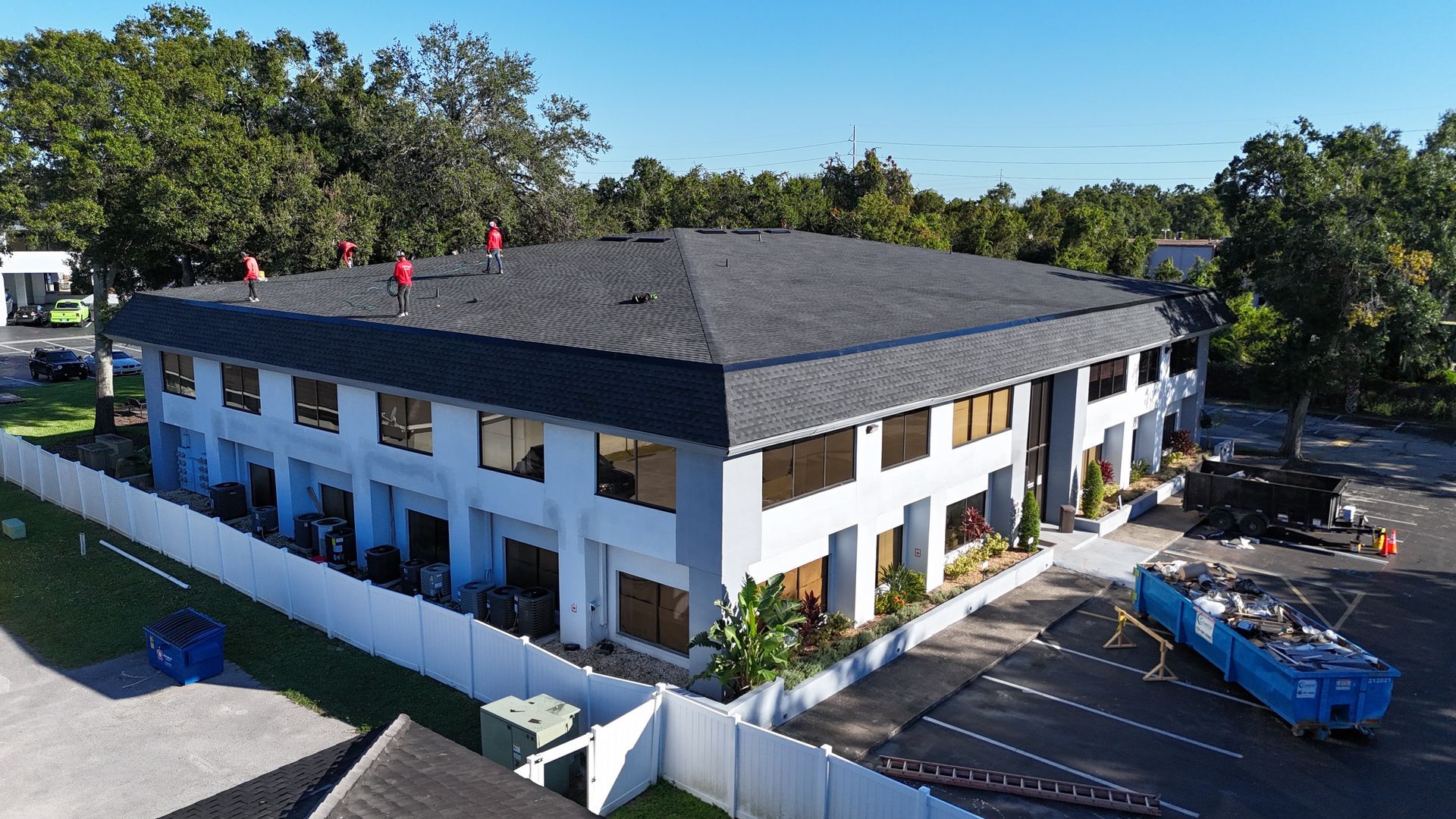 Roofer in Tampa FL: new shingle roof installed by Red Truck Roofing on a Tampa Bay home