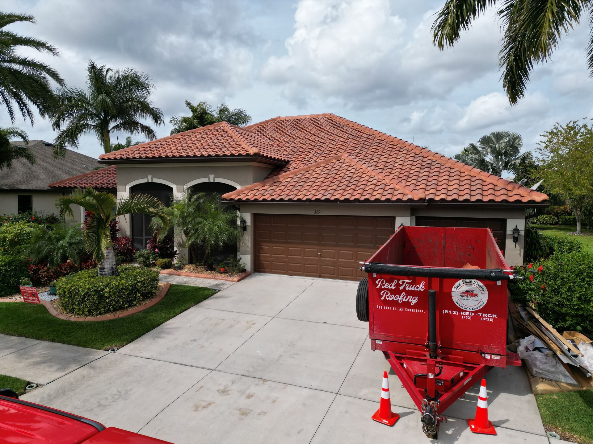 Roofing company Odessa FL line item roof replacement estimate from Red Truck Roofing showing materials, labor, permit fees and decking allowance