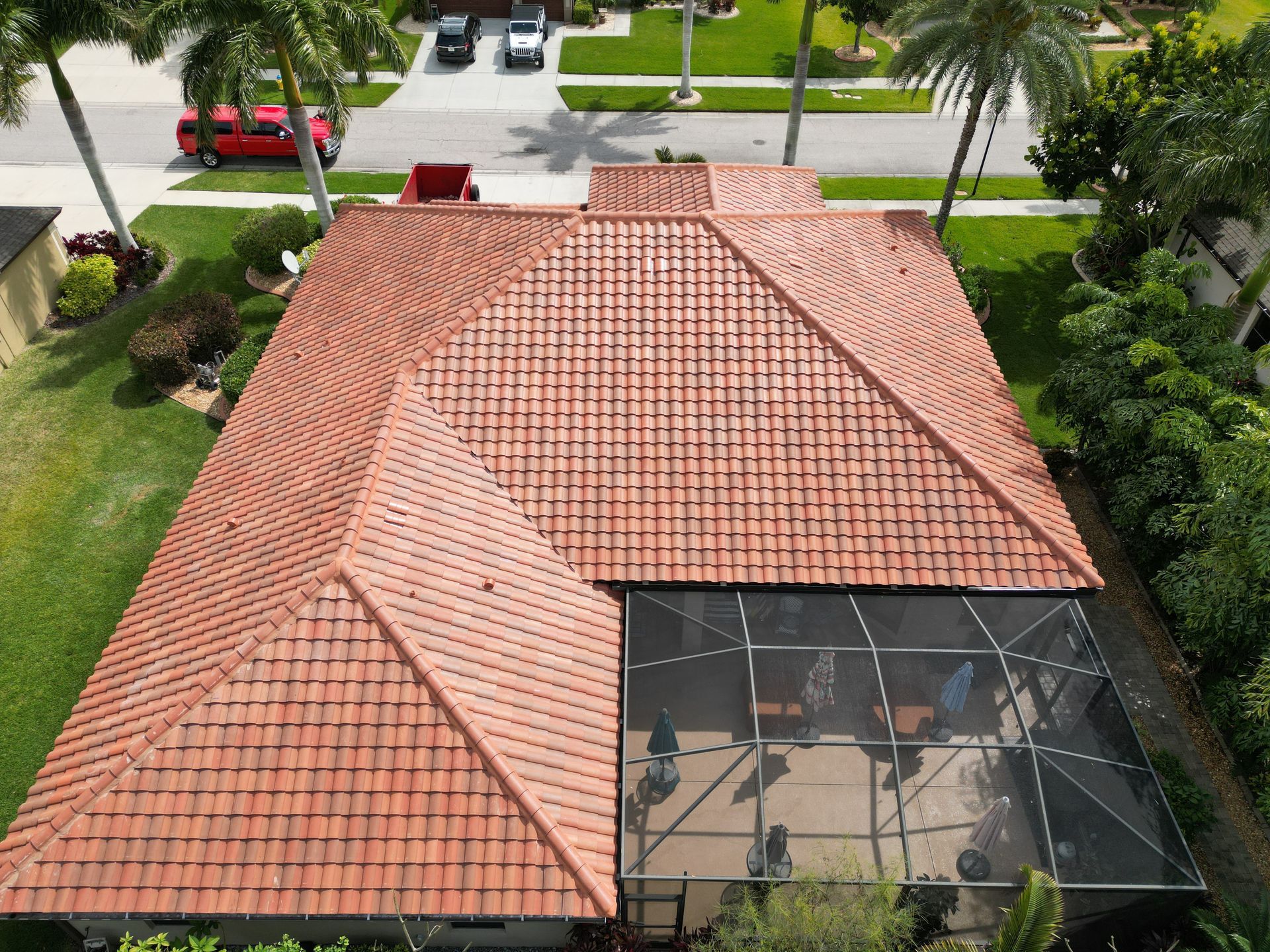 Tile roofer in Tampa FL: Red Truck Roofing installing Ludowici clay tile on a Mediterranean style South Tampa home