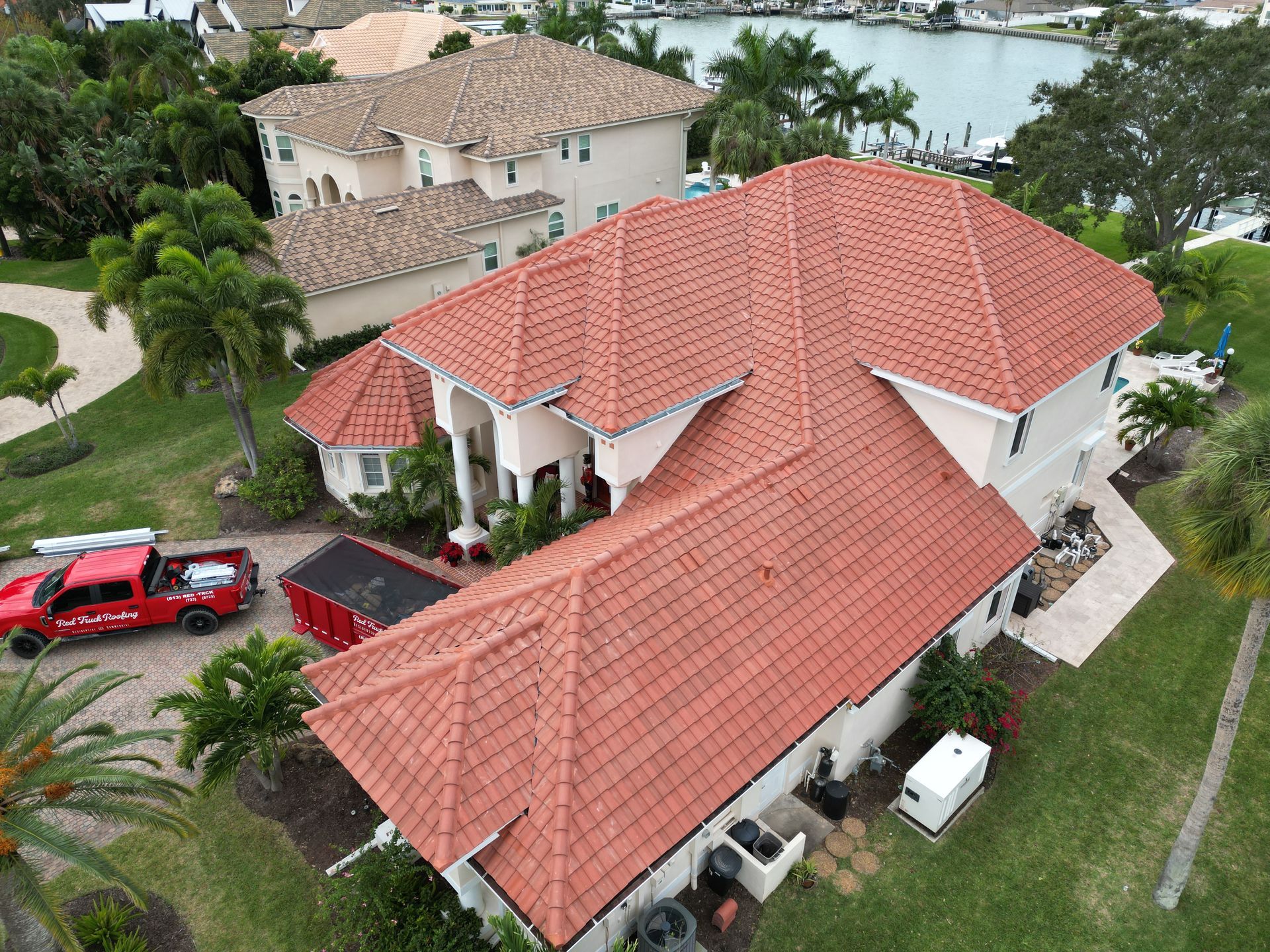 Multi family roofing contractor Seminole FL: Red Truck Roofing reroofing Bardmoor and Tamarac by the Gulf condo and villa buildings