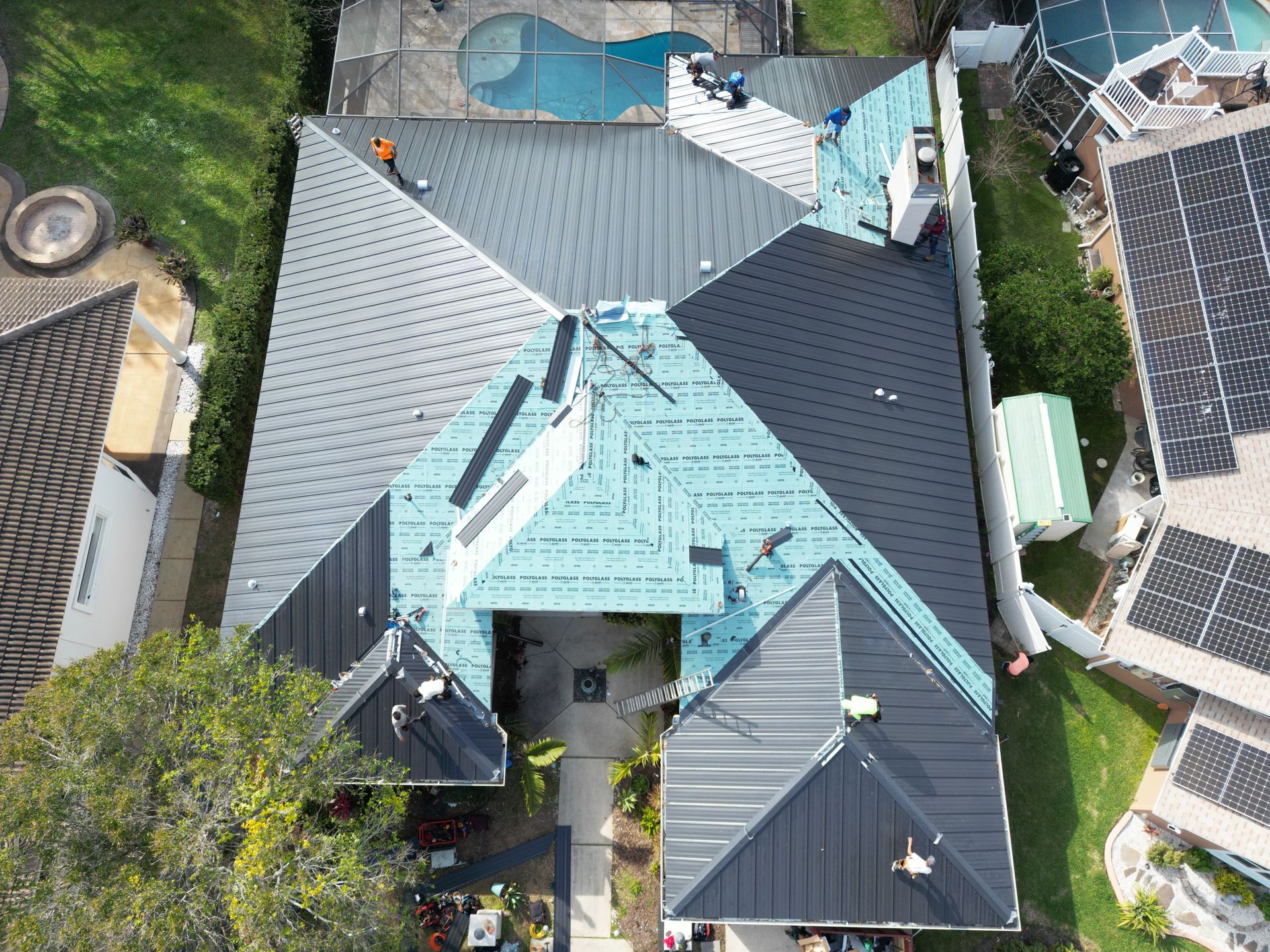 Multi family roofing contractor Seminole FL: Red Truck Roofing reroofing Bardmoor and Tamarac by the Gulf condo and villa buildings