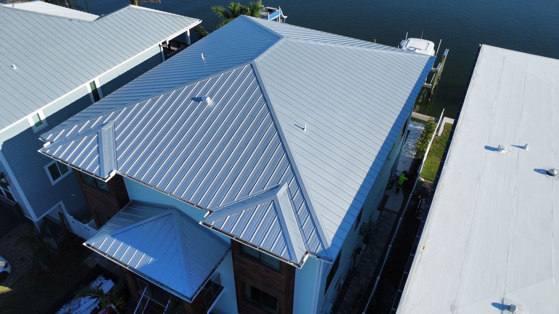 Multi family roofing contractor Seminole FL: Red Truck Roofing reroofing Bardmoor and Tamarac by the Gulf condo and villa buildings