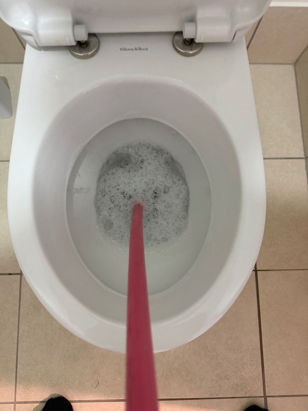A blocked toilet being cleared on the Sunshine Coast