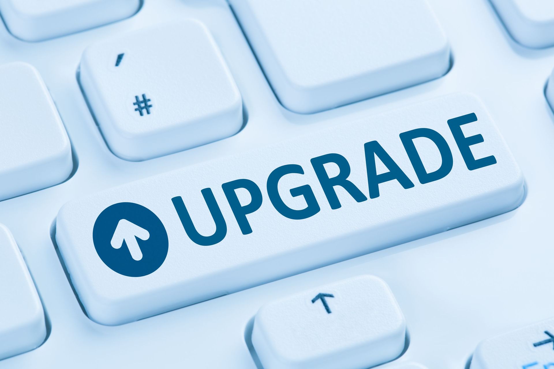 a keyboard with the word upgrade written on it