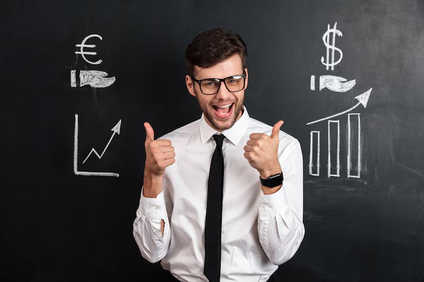 Happy businessman showing thumb up gesture 