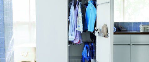 clothes hanging in closet
