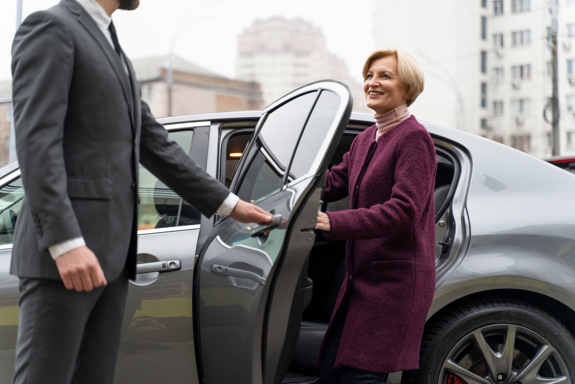 Lady getting out of a CabTime taxi