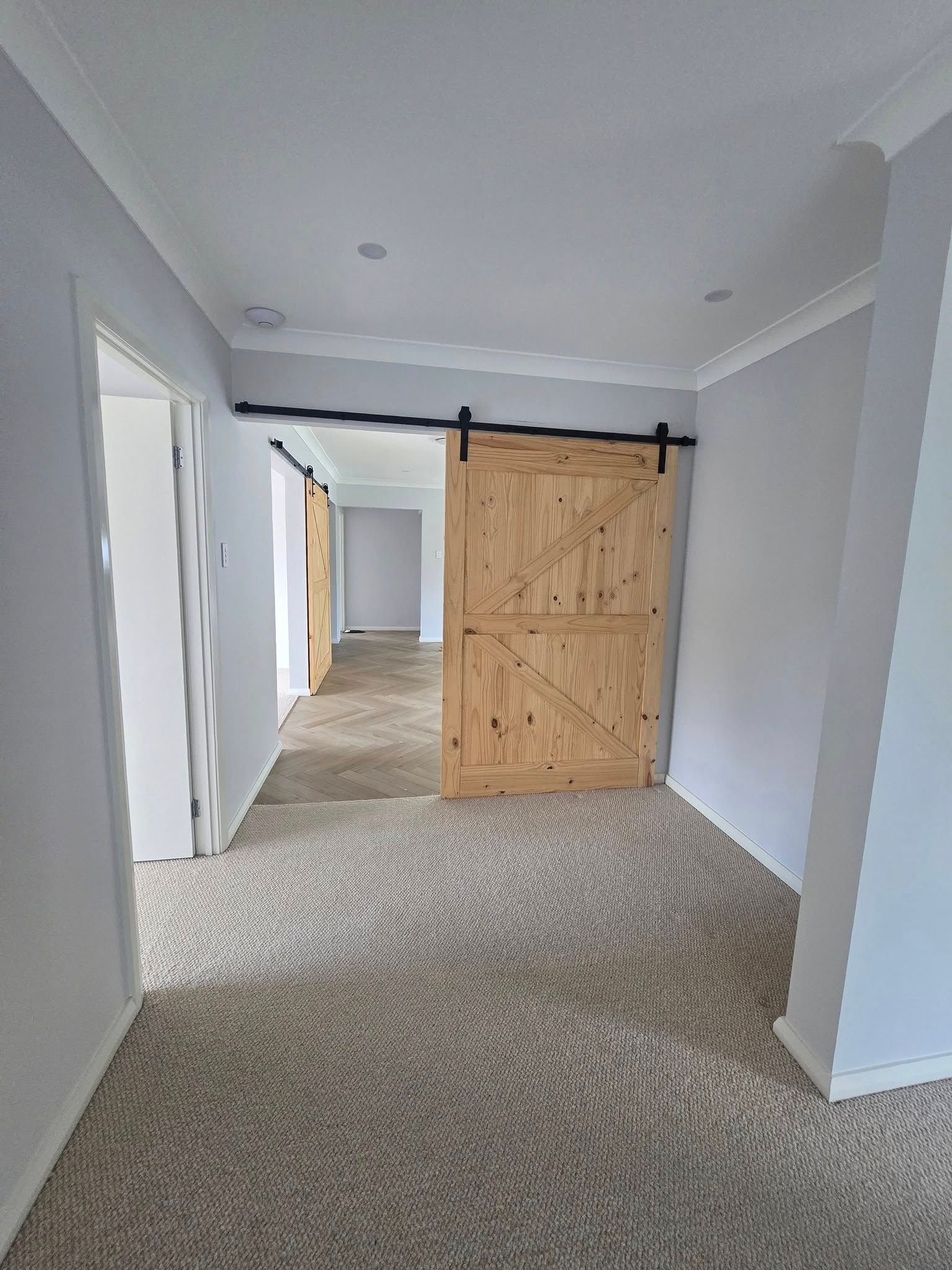 Hallway in the House with Yellow Light on the Ceiling— A Perfect Move And Clean In Bowral NSW