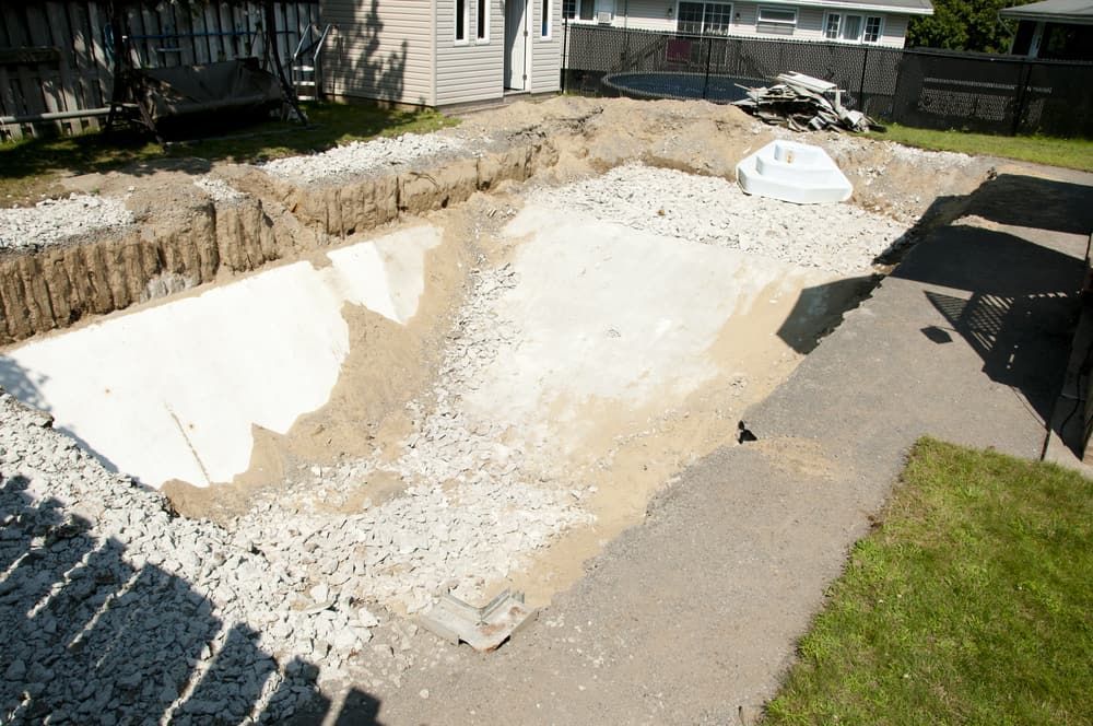 Construction Site: Excavated Rectangular Hole in a Backyard — All Over Pool Removals in Donvale, VIC