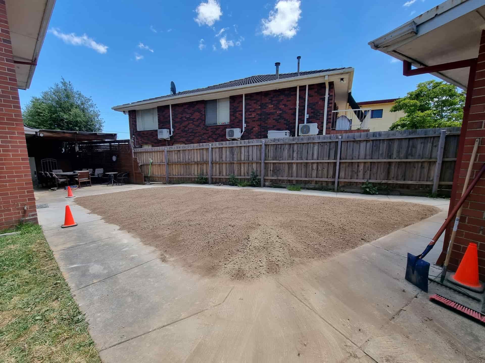 A Backyard Features a Rectangular Gravel Patch Centred — All Over Pool Removals in Lilydale, VIC