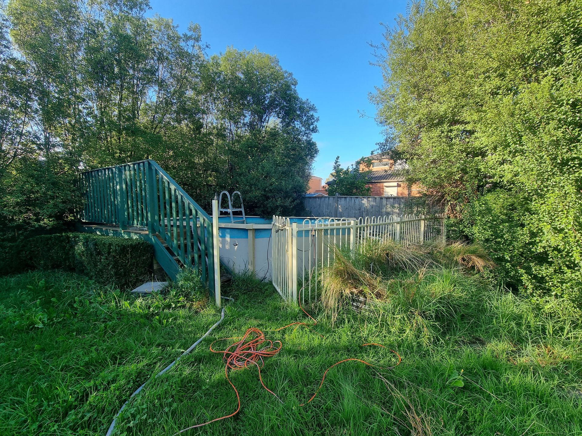 Backyard With Overgrown Grass, a Above-ground Pool — All Over Pool Removals in Upwey, VIC