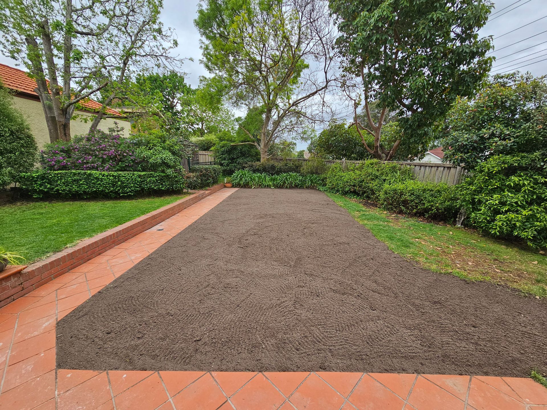 Gravel Driveway Bordered by Red Brick Edging — All Over Pool Removals in Upwey, VIC