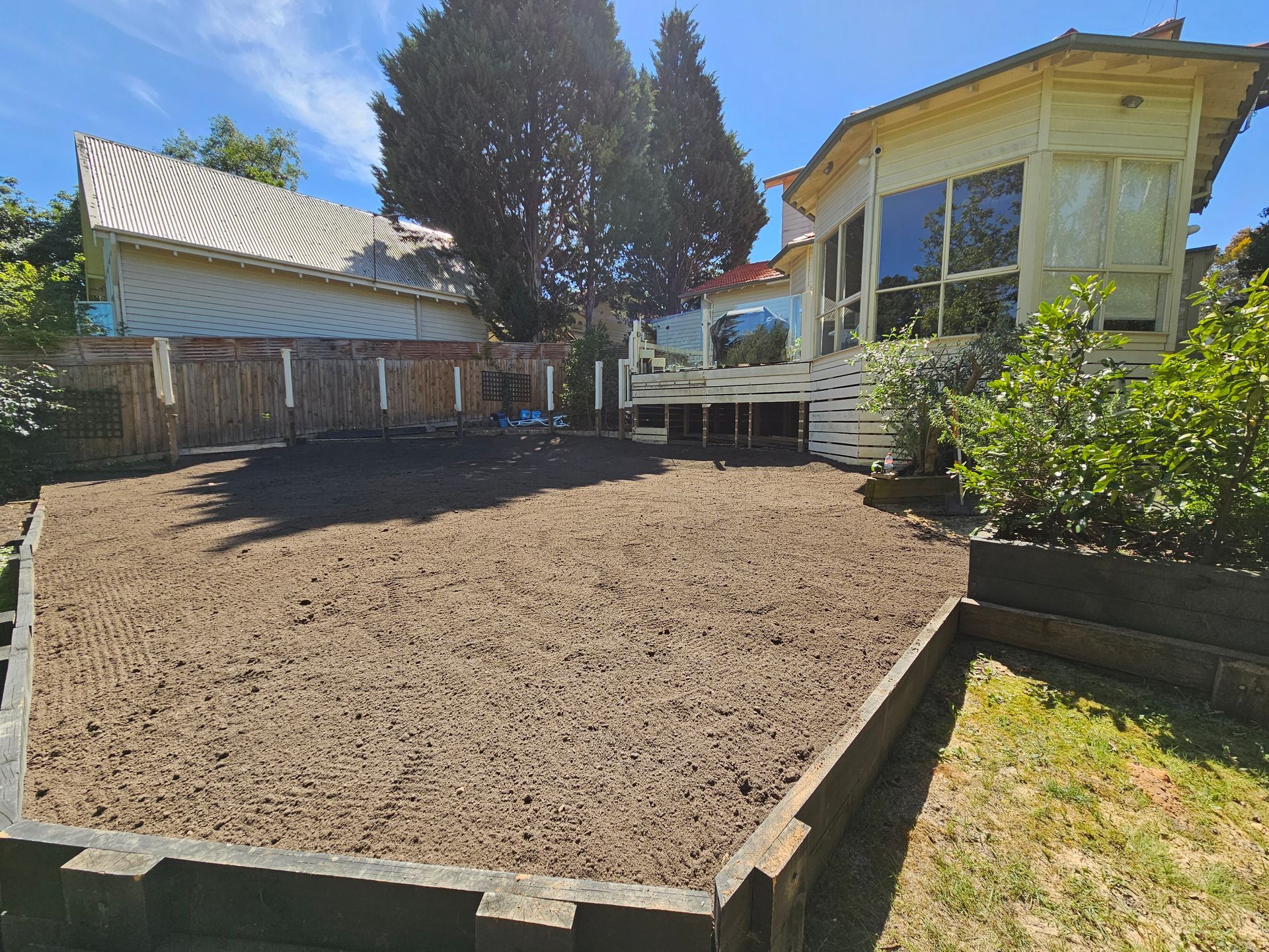 Raised Garden Bed With Freshly Turned Soil — All Over Pool Removals in Hawthorn, VIC
