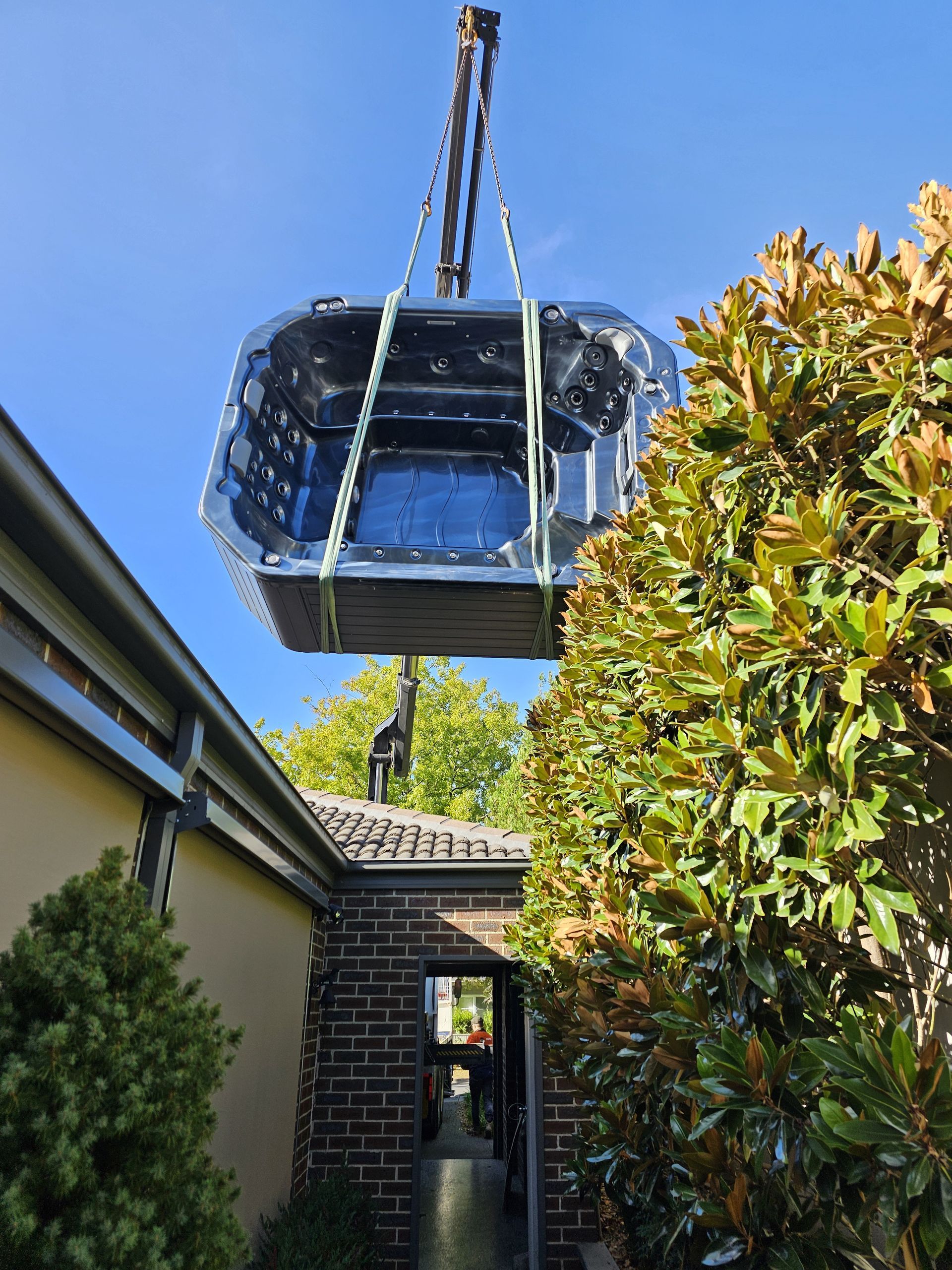 Large Blue Hot Tub or SPA Being Lifted by Crane — All Over Pool Removals in Chadstone, VIC