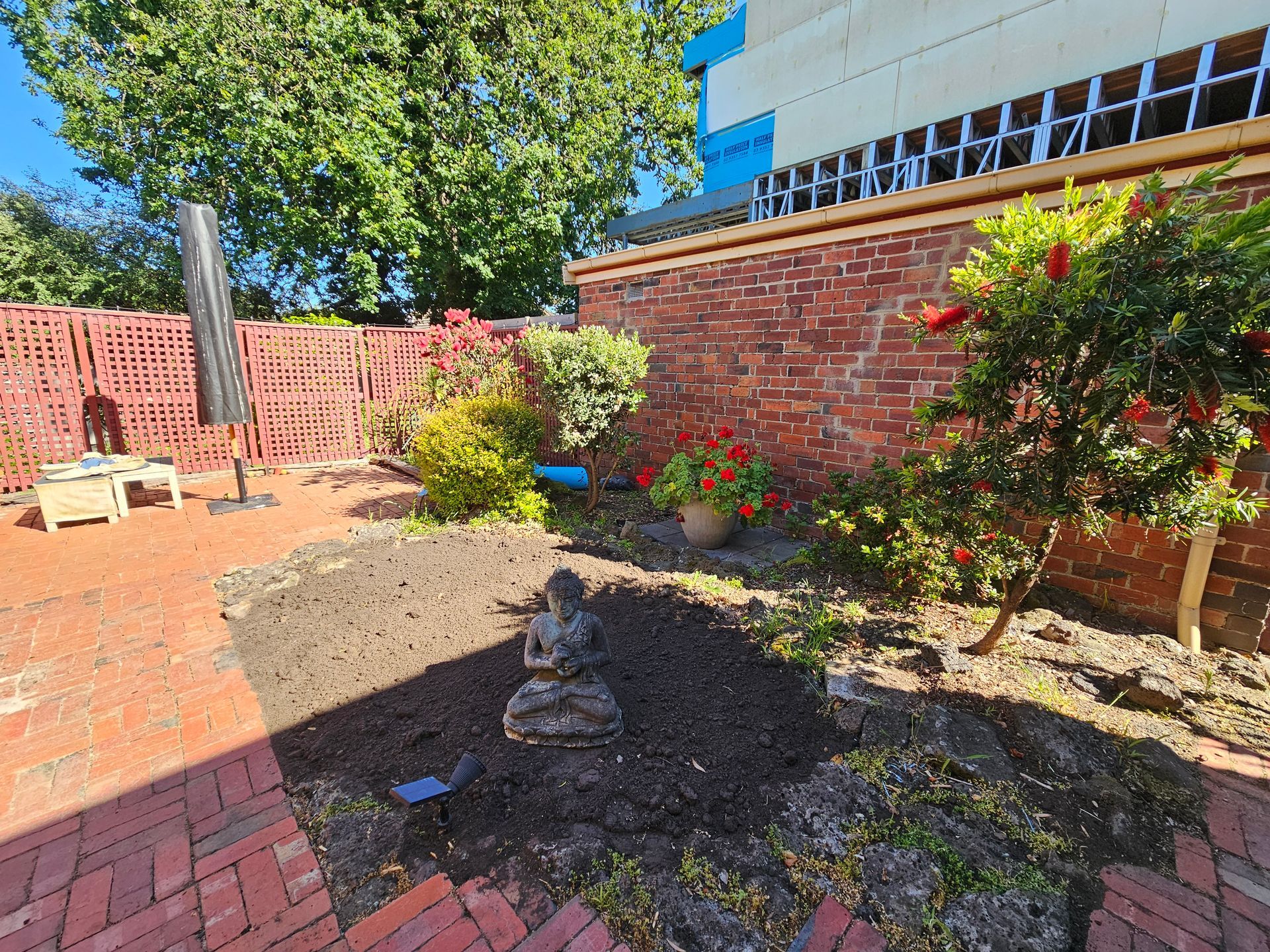 Backyard With Brick Patio, Small Tree, Garden Bed — All Over Pool Removals in Upwey, VIC