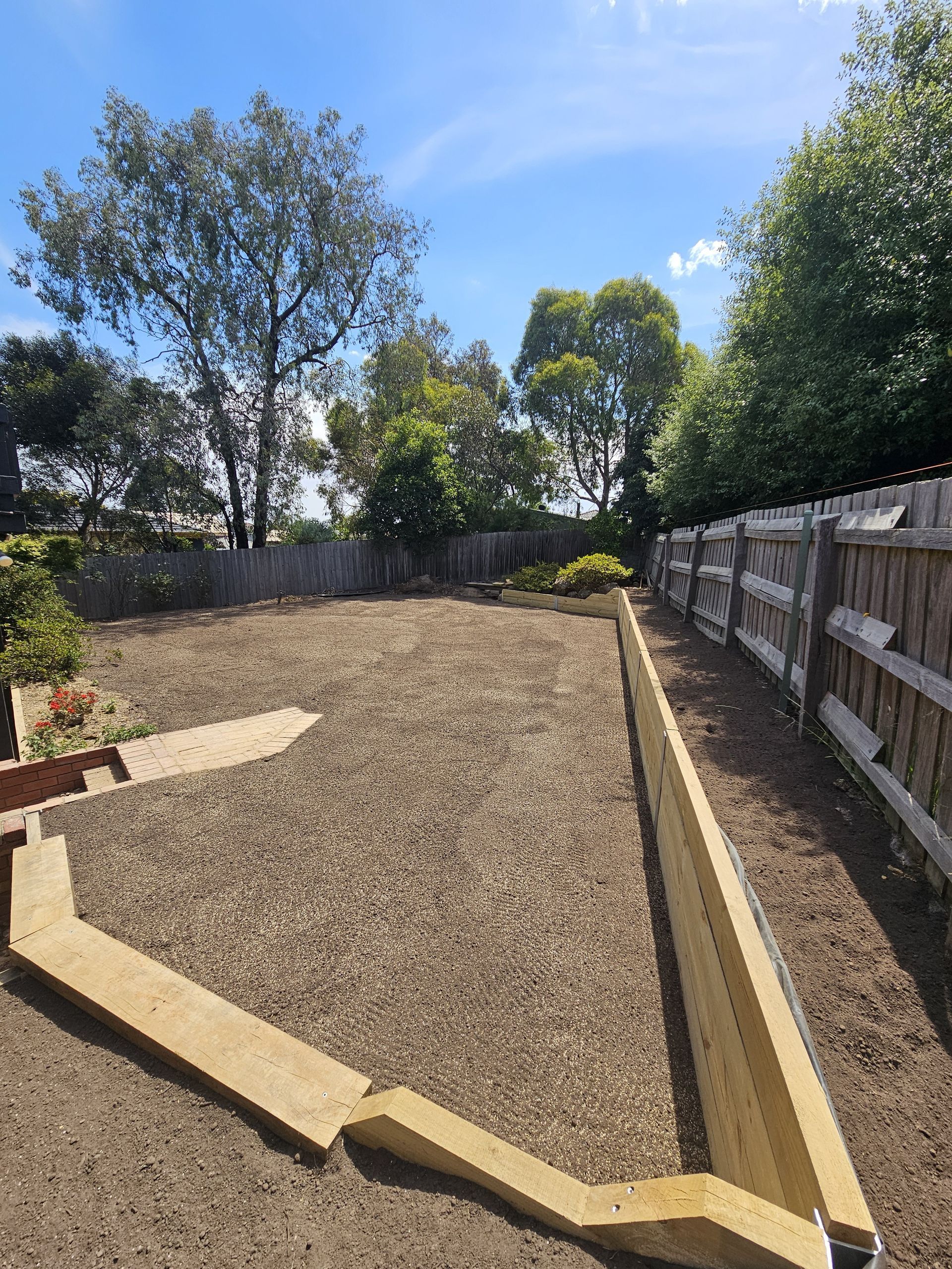 Gravel Backyard Area With Newly Built Timber Border — All Over Pool Removals in Upwey, VIC