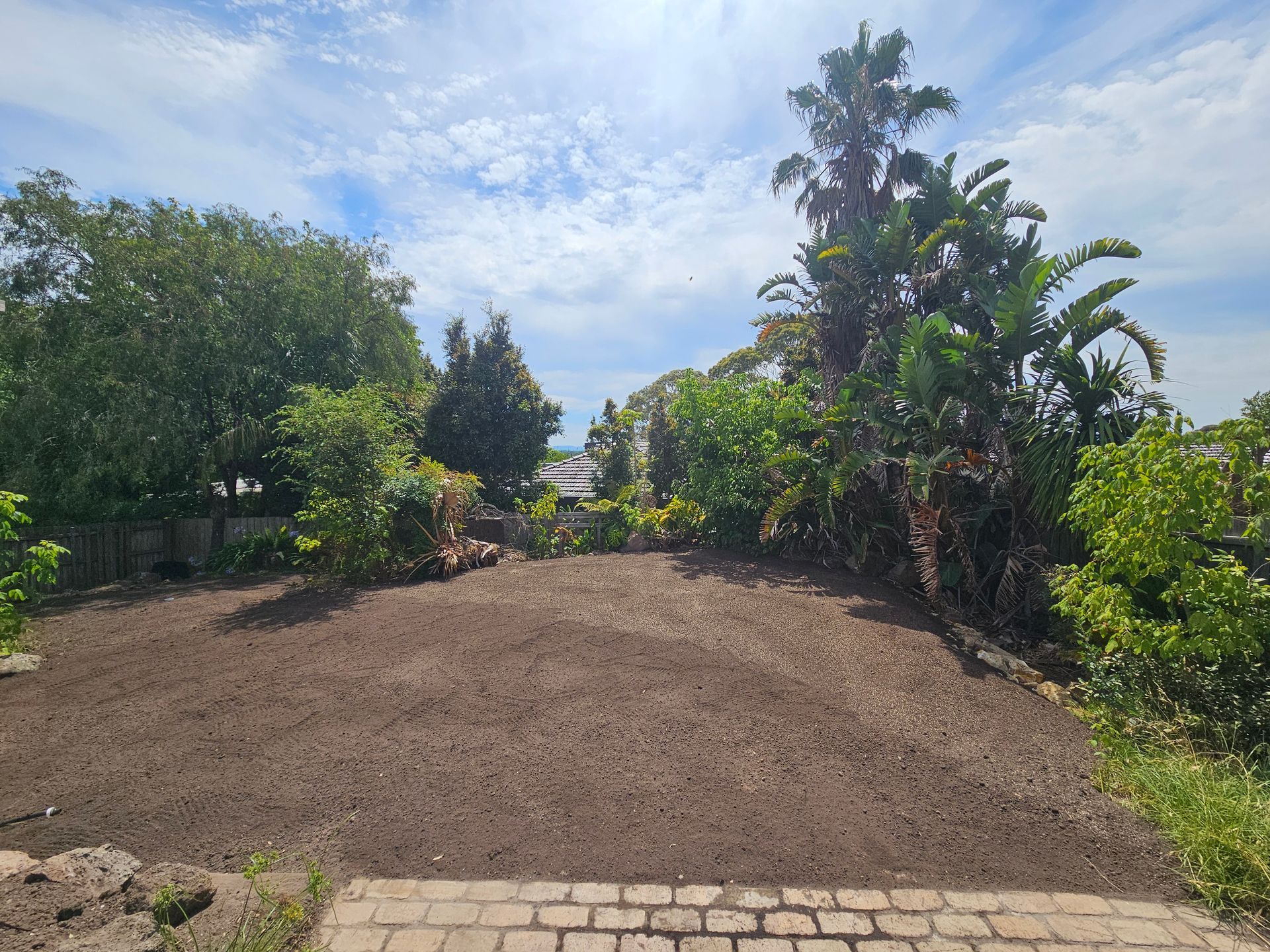 Freshly Tilled Garden Bed in a Sunny Backyard — All Over Pool Removals in Upwey, VIC
