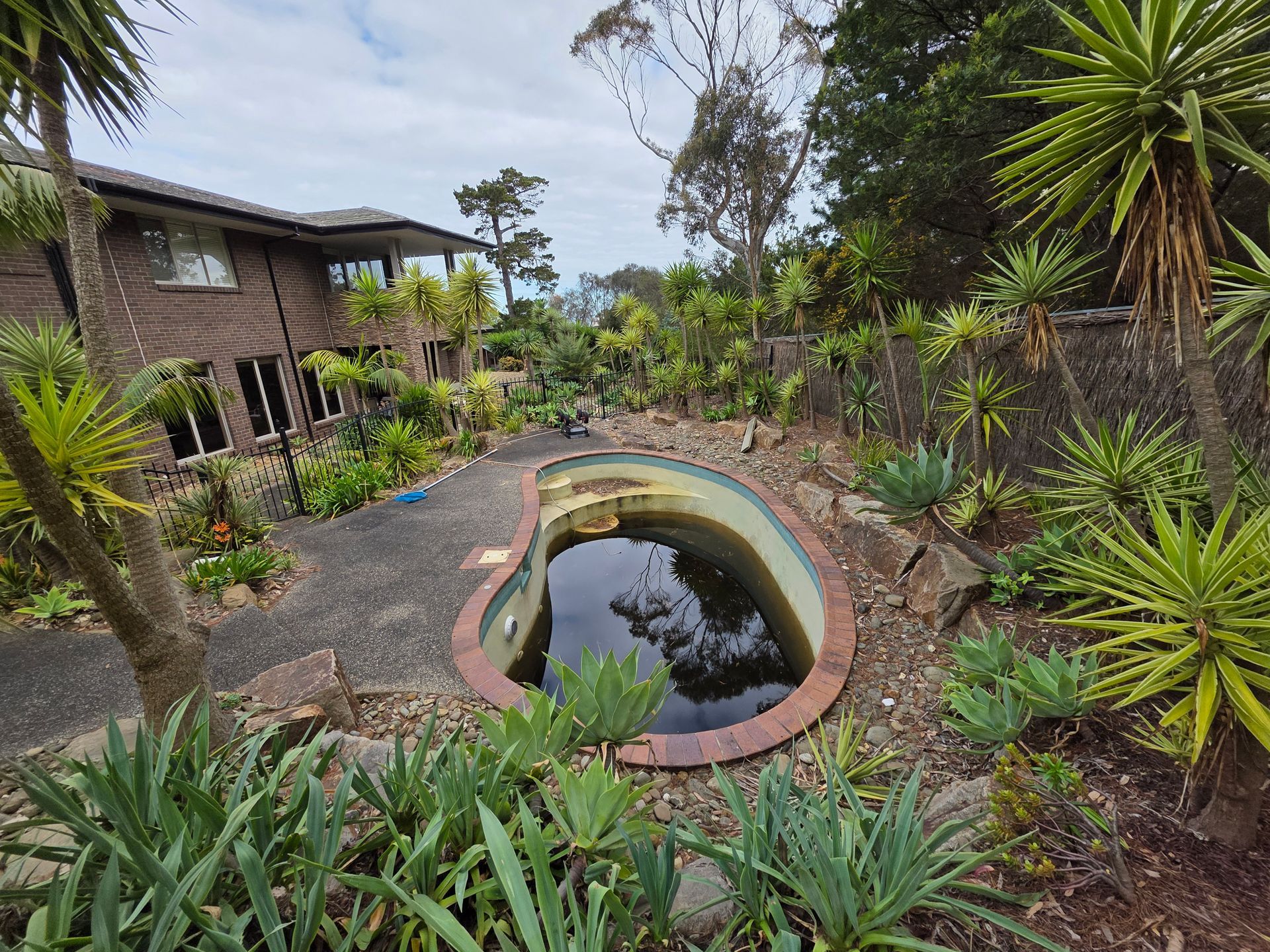 Small Landscaped Garden With a Kidney-shaped Pond — All Over Pool Removals in Upwey, VIC