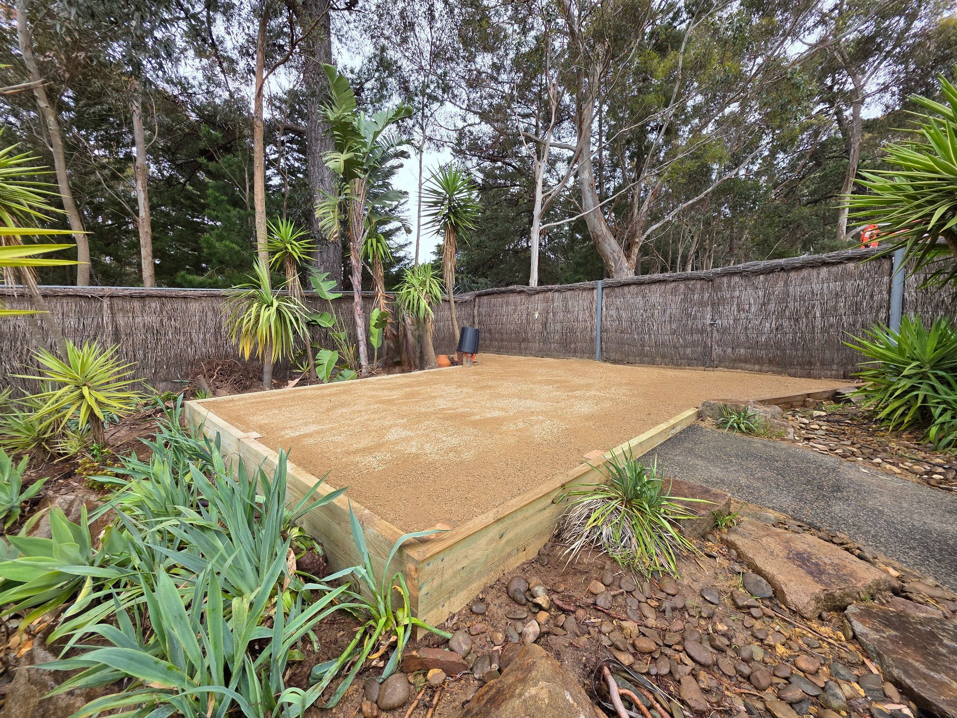 Backyard Pool With Safety Fence, Green Lawn, and Hedge — All Over Pool Removals in Upwey, VIC