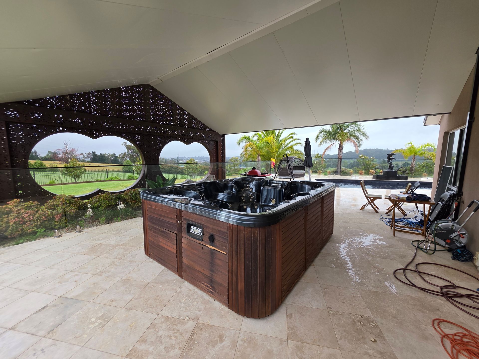 Covered Patio With a Built-in Bar, Dark Chairs — All Over Pool Removals in Upwey, VIC