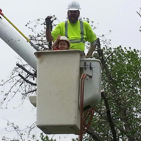 Father and Son on the Crane — West Middleton, IN — Rice Tree Company Inc.