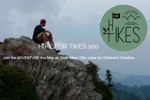 A man is sitting on top of a rock with the words hike for tikes 100 on the bottom