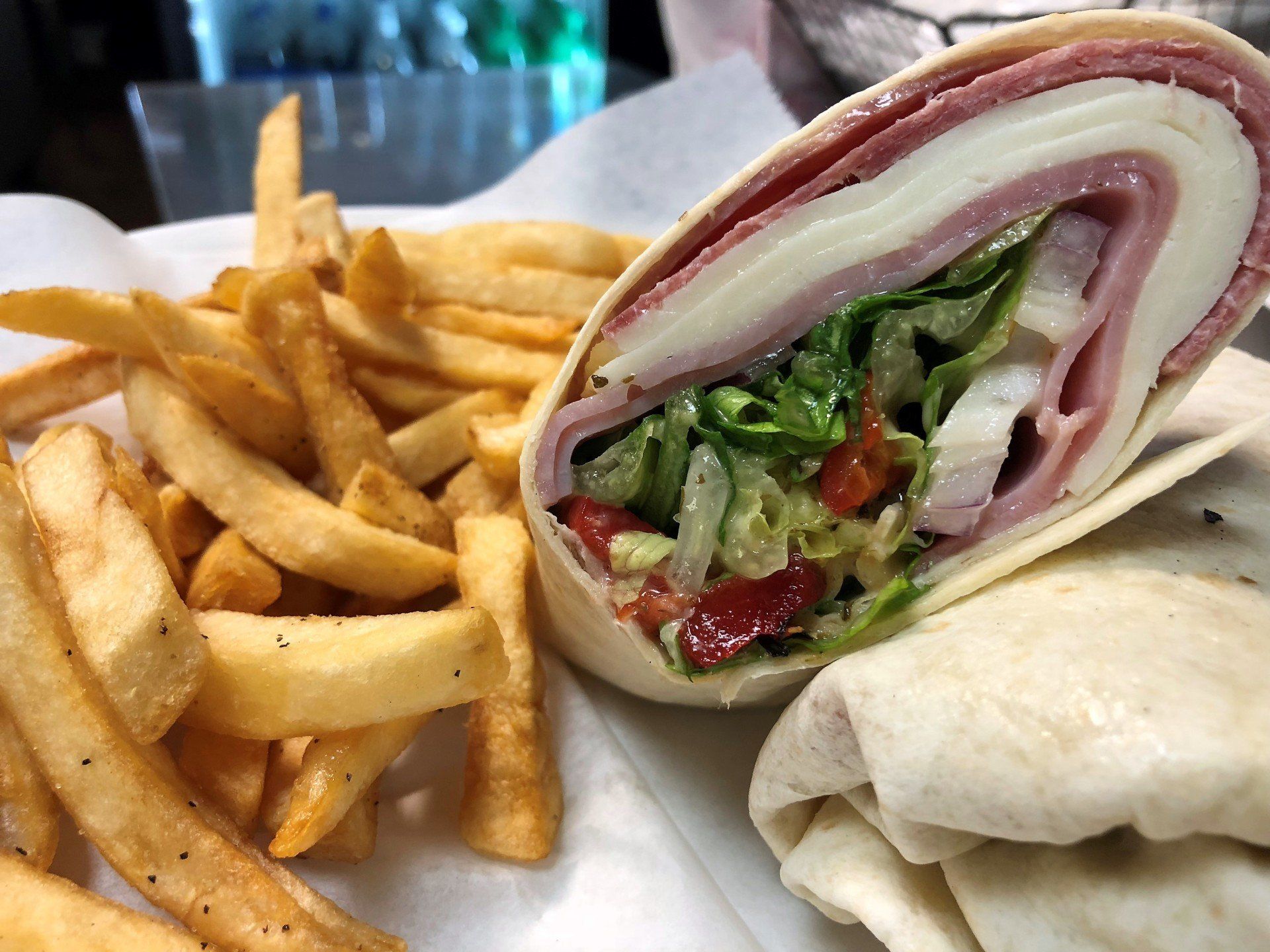 Ham and cheese wrap with fries at Big Louie’s Pizzeria