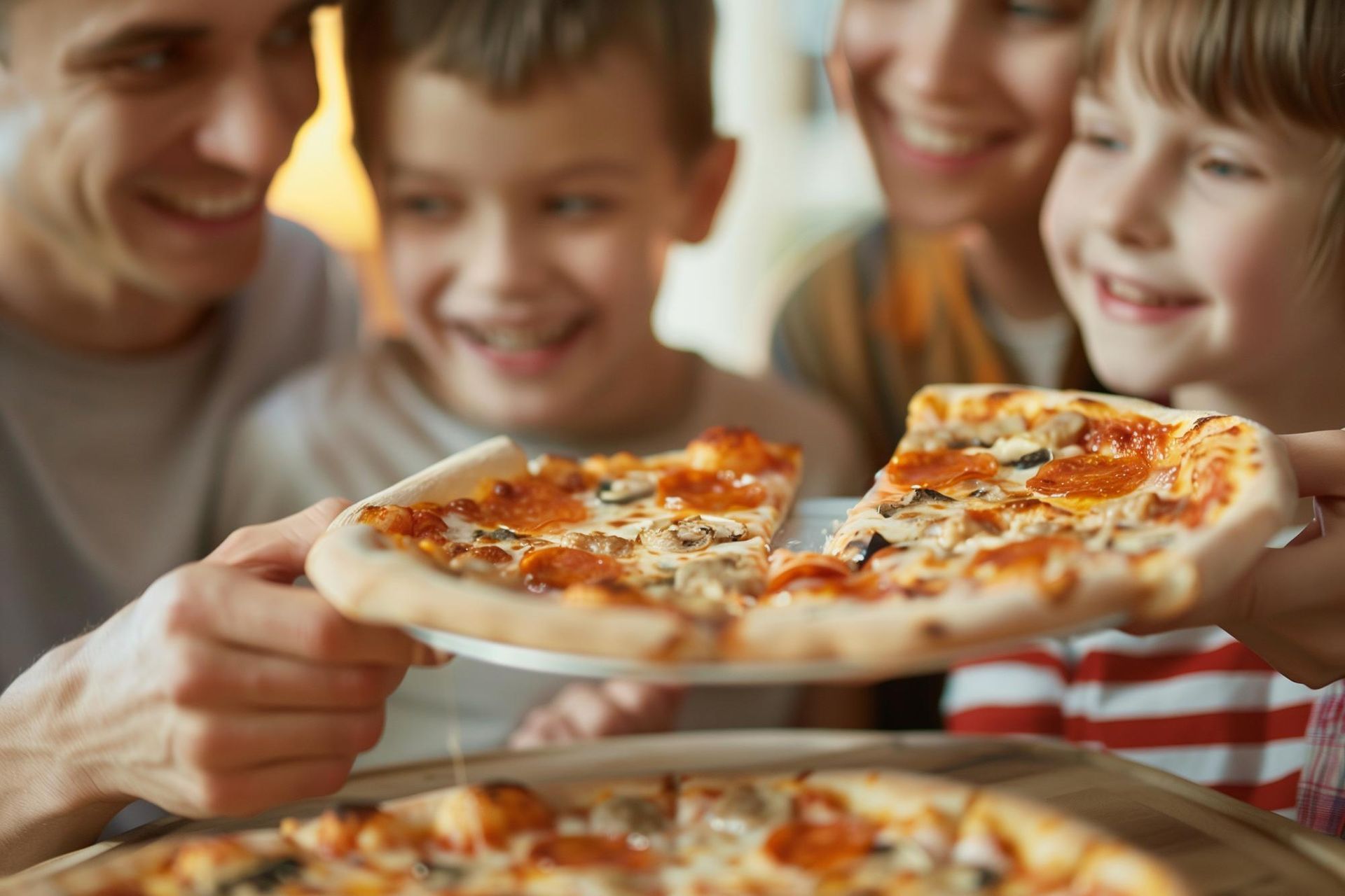 family eating pizza