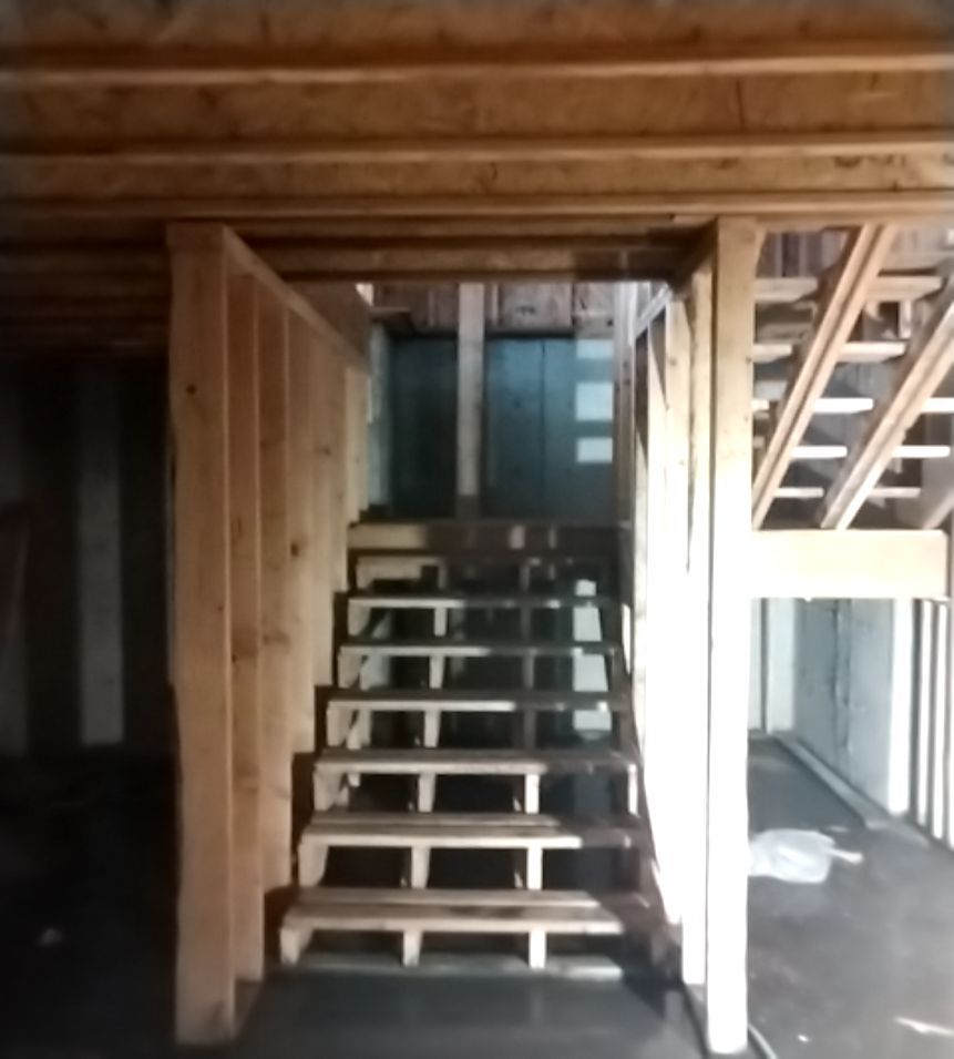 Framed custom home ready for insulation installation in Spokane County