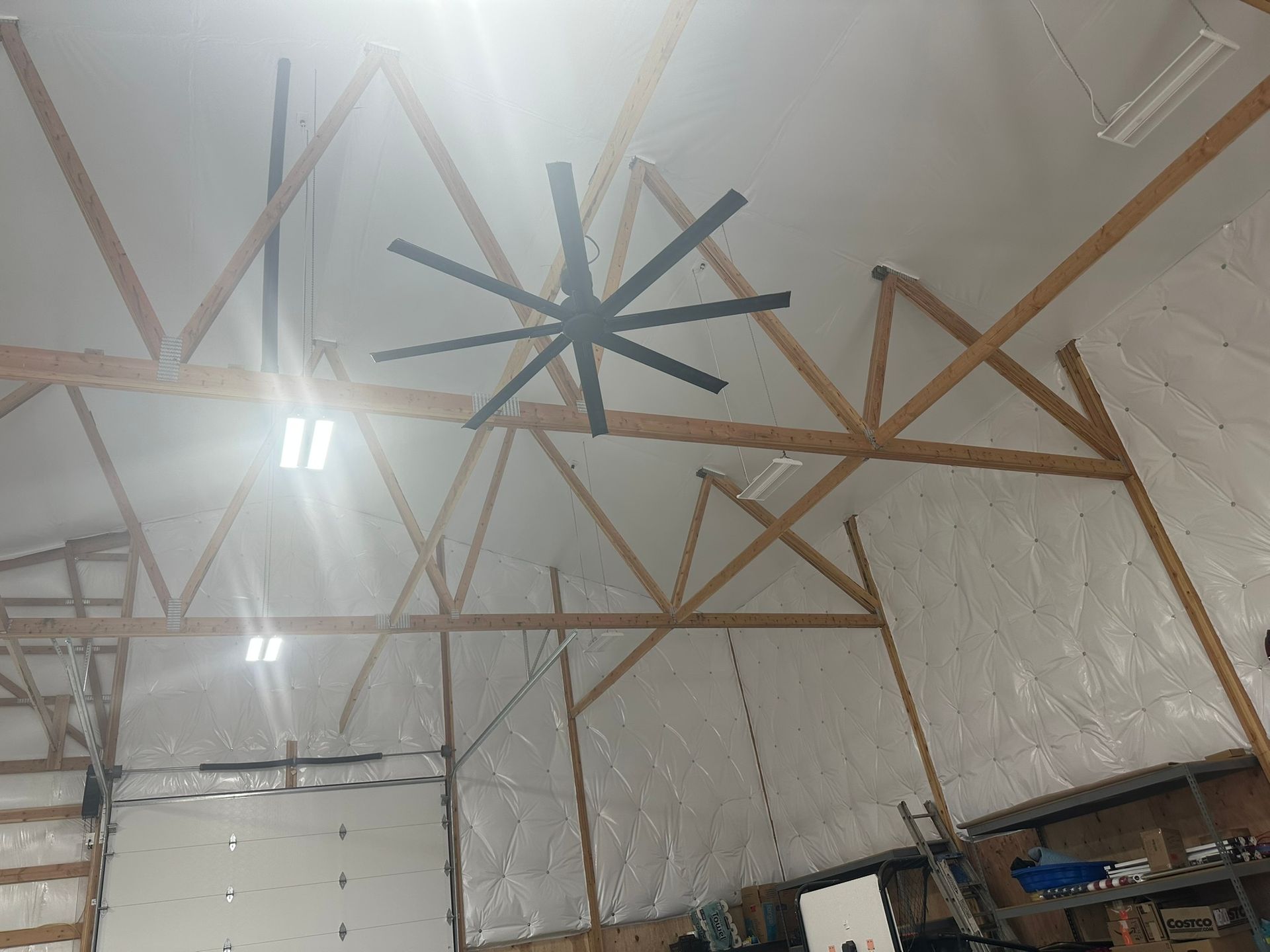 Pole barn ceiling insulation with vapor barrier in Spokane Valley shop