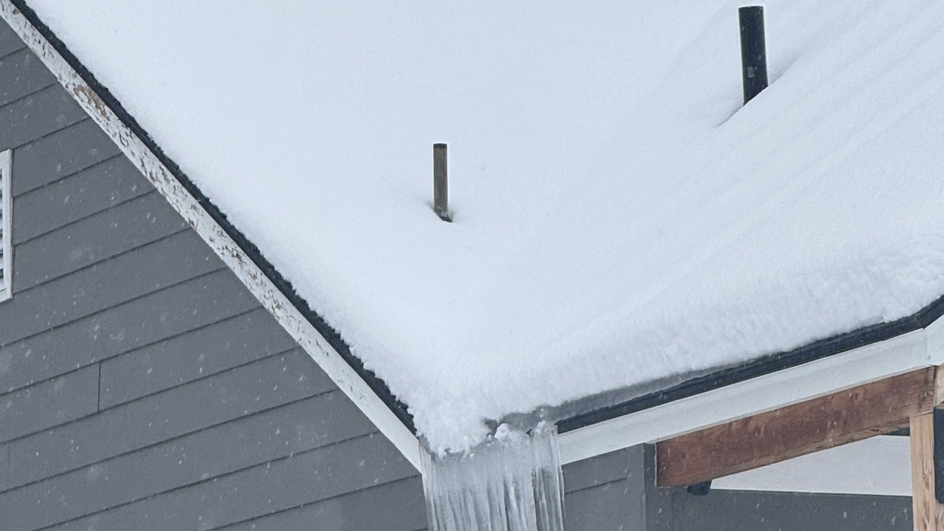 Before and after of a Spokane attic: thin settled insulation with exposed joists, then fresh R-60 Cl