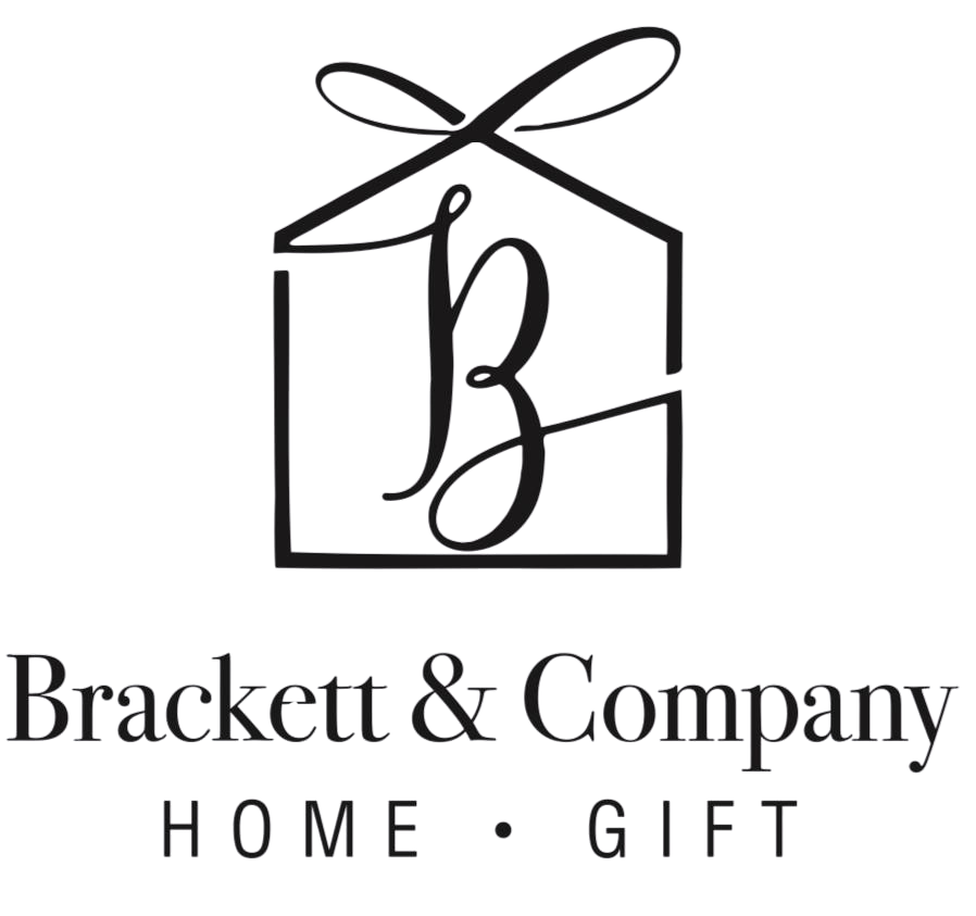 Black Brackett & Company Home Gift logo with a ribbon-topped house icon and stylized initials.
