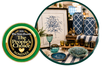 Two men standing behind a counter with “The People’s Choice” logo beside them